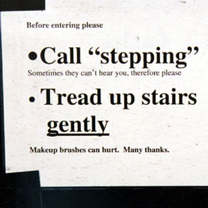 Warning sign outside makeup room