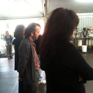A moment of silence for Christchurch earthquake victims, in the food tent at Stone Street Studios, 7 March 2011