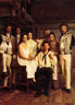 Francesca Annis (Juliet) and Ian McKellen (Romeo) sitting with the cast of 1976 RSC Much Ado About Nothing, left to right: Robin Ellis (Don Pedro), Richard Durden (Claudio), Cherie Lunghi (Hero), Ivan Beavis (Leonato), Judi Dench (Beatrice), Donald Sinden (Benedick)