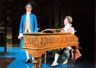 Mozart (Tim Curry) wittily transforms a pedestrian piece by Salieri (Ian McKellen) into his own music