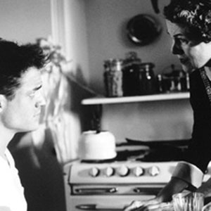 Clay Boone (Brendan Fraser) and Hanna (Lynn Redgrave) have a frank discussion in the kitchen.