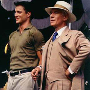 James Whale (Ian McKellen) and Clayton Boone (Brendan Fraser) attend a soggy garden party at George Cukors.