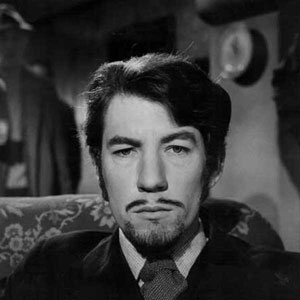 The grown-up Leonidik in false beard and moustache