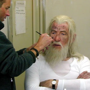 Rick applies Gandalf the Whites make-up under the slopes of Mount Ruapehu, the live volcano, the appropriate setting for the explosive battles of The Two Towers. These scenes were shot only days after shooting Gandalfs entrance into Hobbiton at the beginning of the first movie, May 2000.