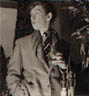 <I>In rep theatres in the 60�s, actors were required to provide their own stage-clothes for modern plays.  Here as a silly-ass rich boy who drives an E-type Jaguar, I sported my old school tie.</I>