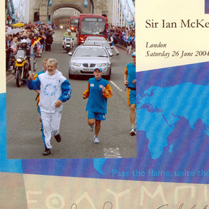 2004,   Carrying the torch across Tower Bridge, 26 June 2004  