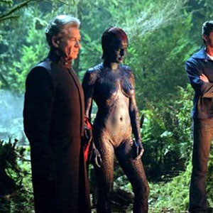 Mageneto (Ian McKellen), Mystique (Rebecca Romijn), Wolverine (Hugh Jackman) and Storm (Halle Berry) in the woods.