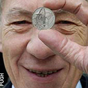 2003, THE LORD OF THE RINGS: RETURN OF THE KING: With British Miint Gandalf Coin  - Photo by Geoff Pugh
