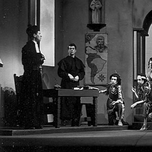 Why do you kneel to me?  I am not a King or Governor -- but a priest of God.  (Ian McKellen, left)