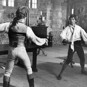 The Pimpernel (Anthony Andrews) on his way to defeating Chauvelin (Ian McKellen) with foils (action director Peter Diamond.)