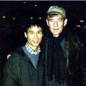B.D.Wong and Ian McKellen night-filming on the backlot at Universal Studios
<BR><BR><I>After principal photography I was called back for an extra scene to be shot on location in San Francisco where Kraus and his lover lived. I enter the apartment after a three week visit to Washington DC, briefly kiss my lover and exit with him presumably to bed.  A young executive from the producers observed shooting on a remote-control video screen away from the set, whence he sent a message that the scene was getting too steamy.  I remonstrated and was warned that any such intimacy would alienate viewers,  even in a film about AIDS.  As the film opened with scenes of the epidemic raging in Africa with diseased and bloodied corpses being burnt (and all this before the opening credits) I felt that any audience who had survived that shock, could take a peck on the lips between two men without too much angst.  Nevertheless, the new scene was not broadcast.</I>