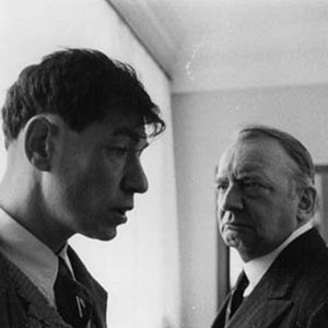 Walter (Ian McKellen) tells his boss (David Ryall) that his father has gone to live with Jesus.