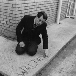 His adventures over, Walter (Ian McKellen) immortalises his name in the fresh concrete path round his hospital quarters.