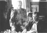 Ratcliffe pours coffee for his officer, Richard