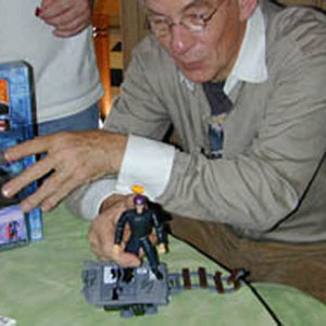 2000, X-MEN: Playing with Magneto action figure  - Photo by Keith Stern