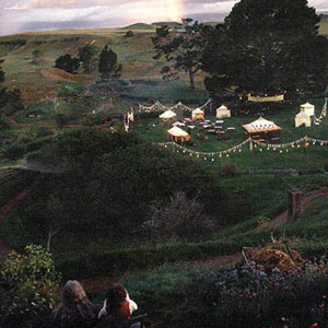 Ian McKellen as Gandalf and Ian Holm as Bilbo oversee party preparations in Hobbiton